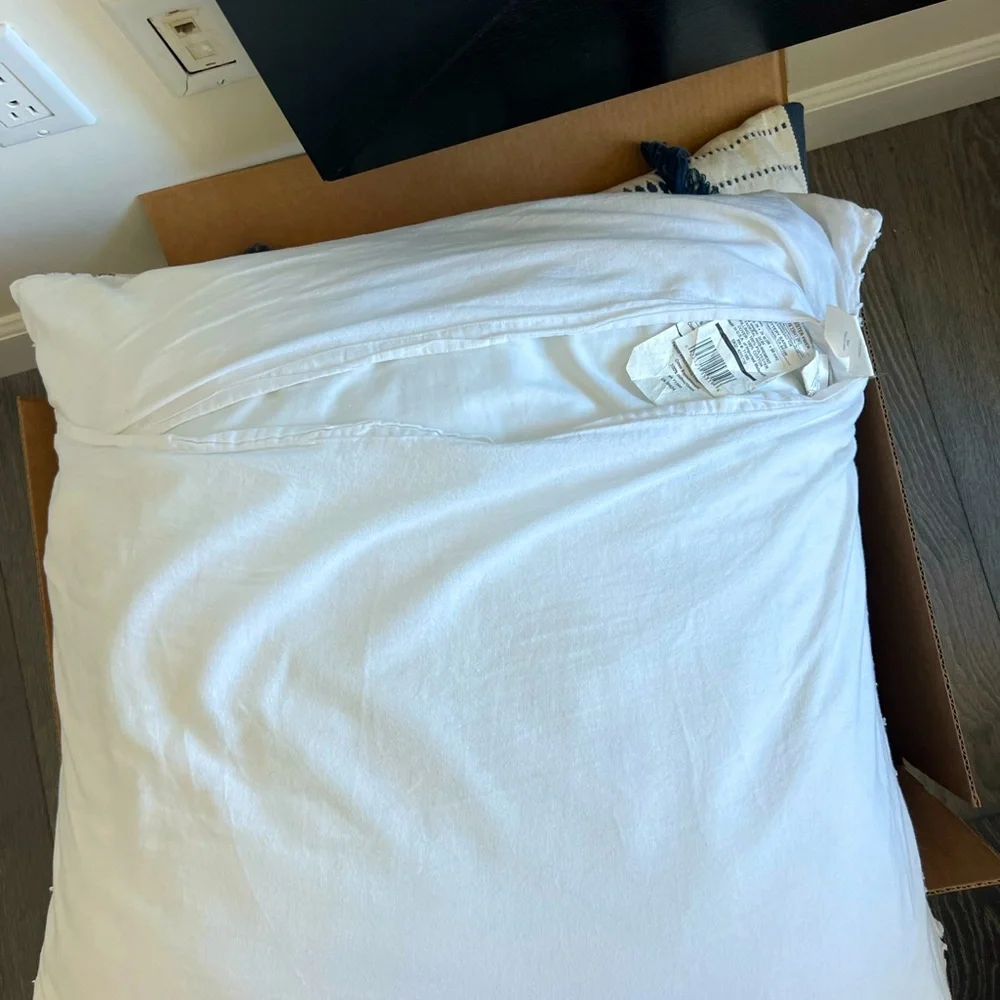 Selling one decorative pillow with matching duvet cover from pottery barn